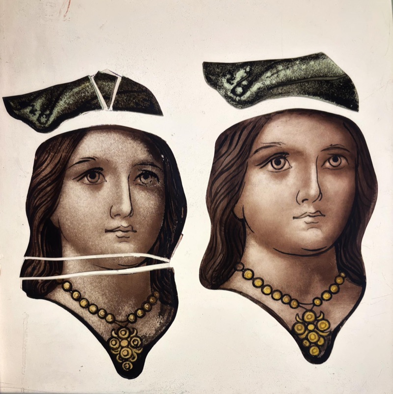 Stained glass painted portrait faces — replicated broken pieces